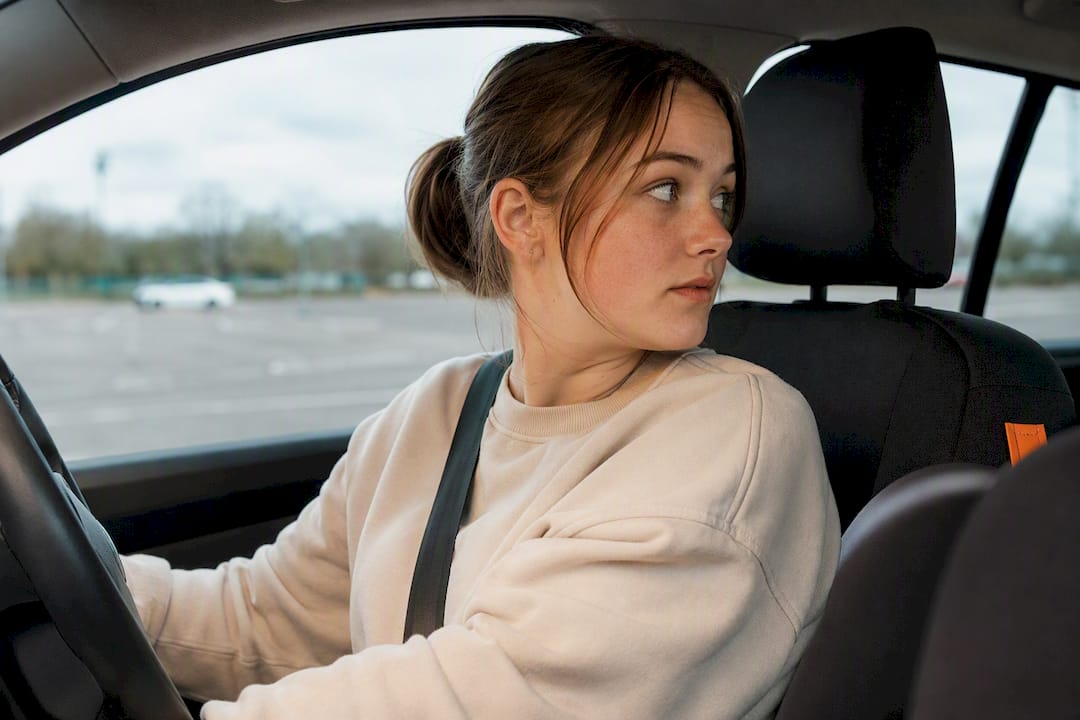 Welcome to Connect Driving School 21 Learner practising a shoulder check