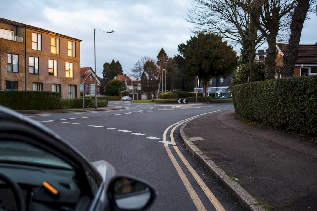 Morden suburban road approaching roundabout